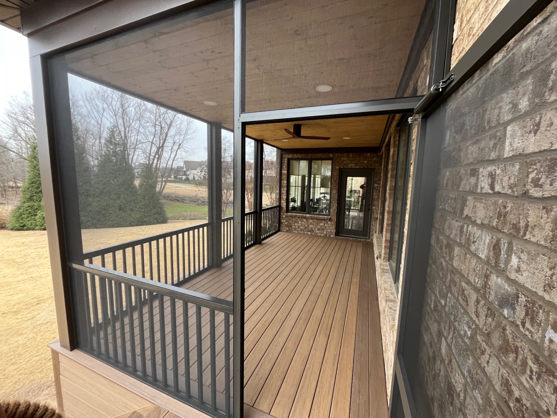 Screened porch interior with vaulted ceiling